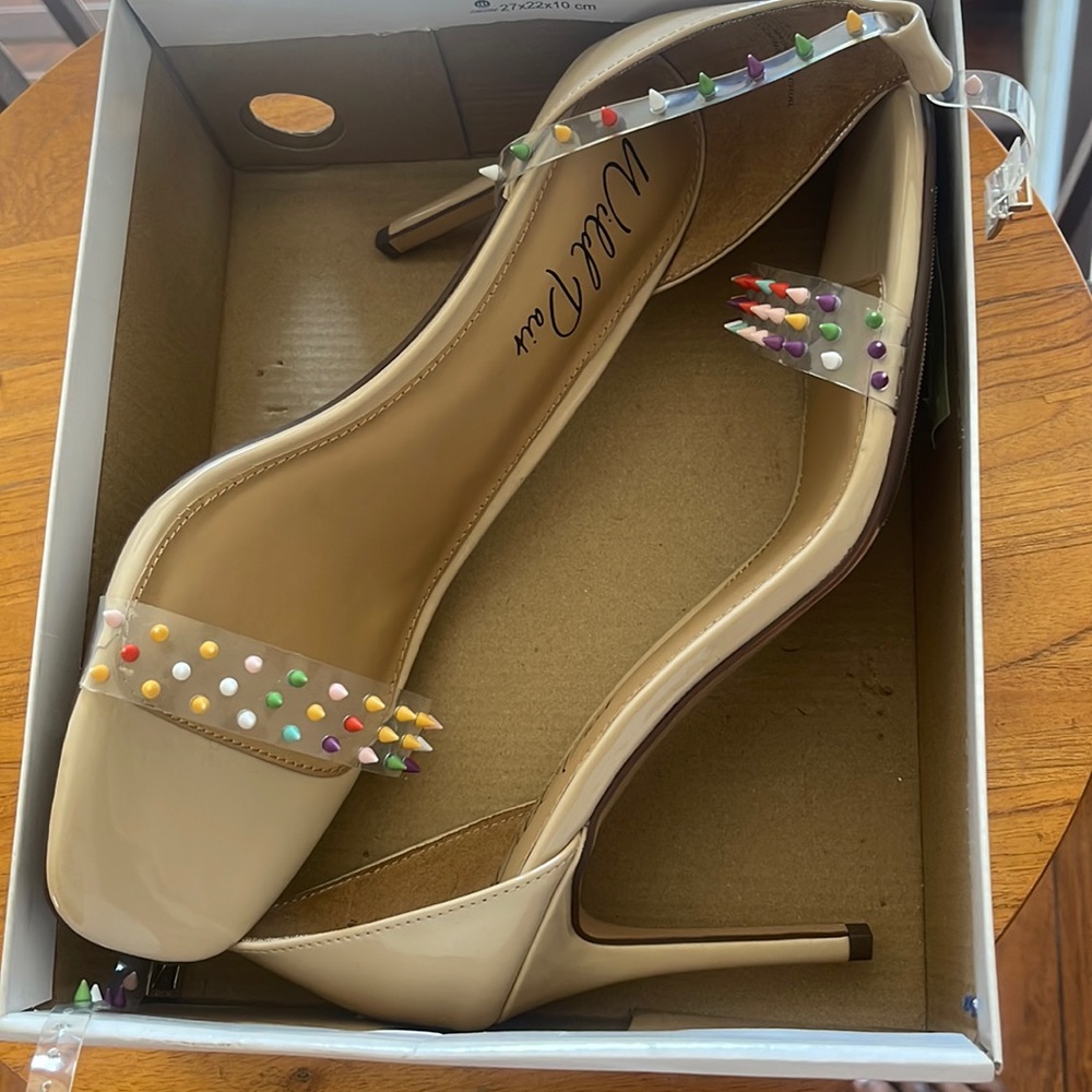 Wild pair nude rainbow spiked and strap heels size 12m